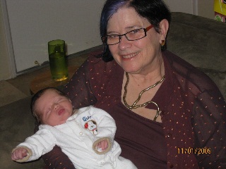 Proud Grandma with Huxley Image of Proud Grandma Janette with Huxley